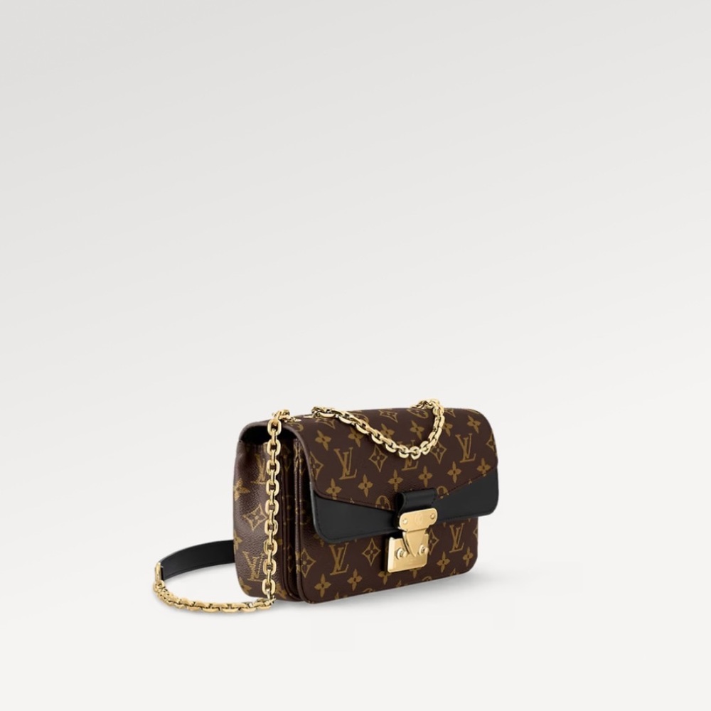 Louis Vuitton Cross body Gold chain handbag.